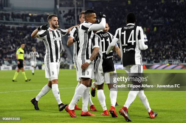 Douglas Costa and Juventus players celebrate after his goal during the Serie A match between Juventus and Genoa CFC on January 22, 2018 in Turin,...