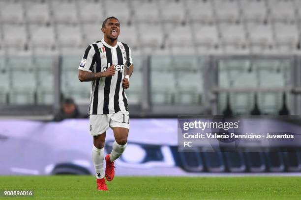 Douglas Costa of Juventus celebrates after scoring a goal during the Serie A match between Juventus and Genoa CFC on January 22, 2018 in Turin, Italy.