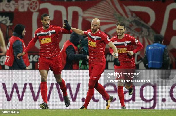 Andre Laurito celebrates the third goal with Daniel Brueckner and Luka Marino Odak of Erfurt during the 3.Liga match between FC Rot Weiss Erfurt and...
