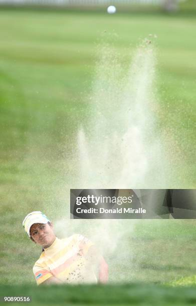 Ai Miyazato of Japan hits out of the 1st green bunker during the first round of the LPGA Samsung World Championship on September 17, 2009 at Torrey...