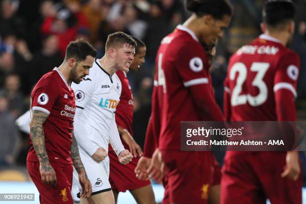Alfie Mawson of Swansea City celebrates at full time during the Premier League match between Swansea City and Liverpool at Liberty Stadium on January...