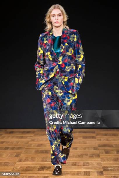 Model walks the runway during the Whyred show on the second day of Stockholm Fashion Week at the Grand Hotel on January 22, 2018 in Stockholm, Sweden.