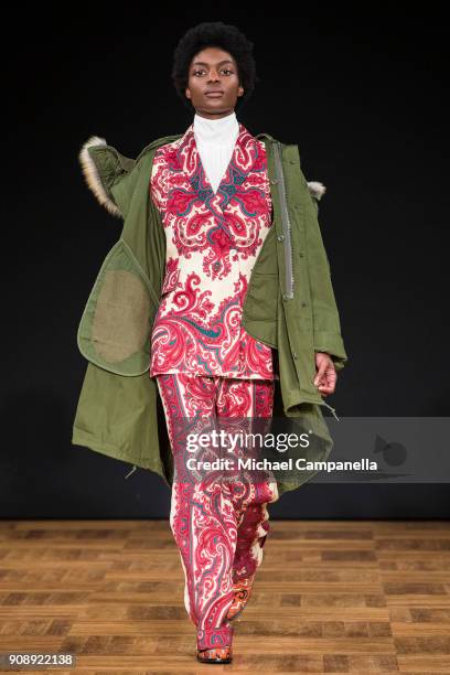 Model walks the runway during the Whyred show on the second day of Stockholm Fashion Week at the Grand Hotel on January 22, 2018 in Stockholm, Sweden.