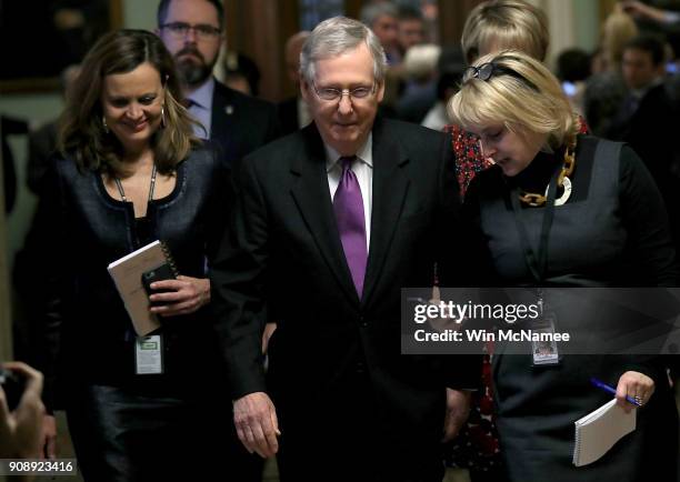 Senate Majority Leader Mitch McConnell leaves the Senate chamber after the final senate vote to end the shutdown of the federal goverment January 22,...