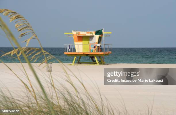 colorful miami beach lifeguard stand - lifeguards cabin stock pictures, royalty-free photos & images