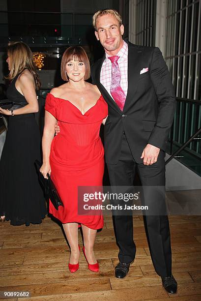 Dr. Christian Jessen and Finty Williams attend the Collars and Cuffs Ball at the Royal Opera House on September 17, 2009 in London, England.