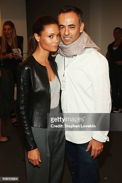 Actress Thandie Newton and designer Francisco Costa backstage at Calvin Klein Spring 2010 fashion show at 205 West 39th Street on September 17, 2009...