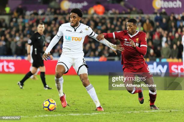 Leroy Fer of Swansea City challenged by Georginio Wijnaldum of Liverpool during the Premier League match between Swansea City and Liverpool at The...
