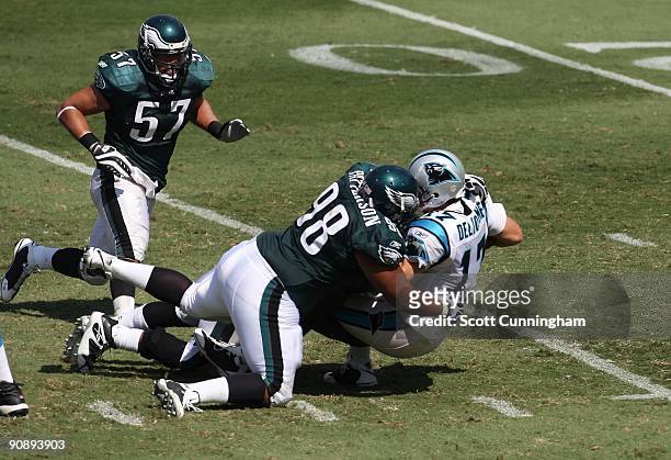 Jake Delhomme of the Carolina Panthers is sacked by Mike Patterson of the Philadelphia Eagles at Bank Of America Stadium on September 13, 2009 in...