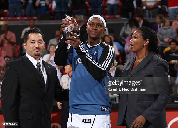 Crystal Langhorne of the Washington Mystics is presented with the Kia Motors 2009 Most Improved Player award before the game against the Indiana...