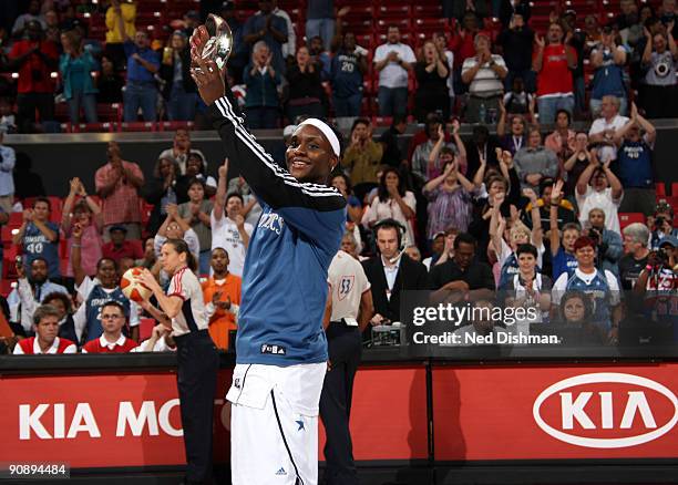 Crystal Langhorne of the Washington Mystics is presented with the Kia Motors 2009 Most Improved Player award before the game against the Indiana...