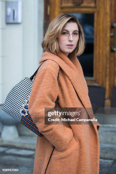 Sandra Ekenstam seen wearing Bitte Kai Rand coat with a bag from River Island during the second day of Stockholm Fashion Week outside the Grand Hotel...