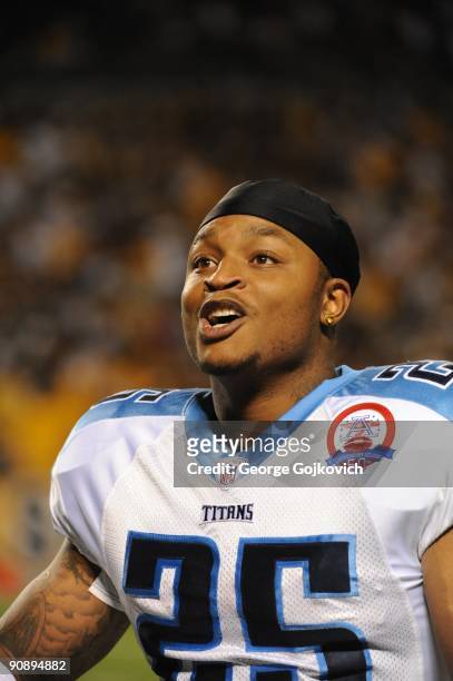 Running back LenDale White of the Tennessee Titans looks up at the fans as he leaves the field at halftime during a game against the Pittsburgh...