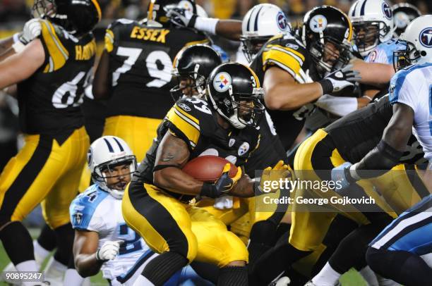 Running back Willie Parker of the Pittsburgh Steelers looks for room to run against the Tennessee Titans at Heinz Field on September 10, 2009 in...