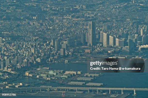 minatomirai area in yokohama city in kanagawa prefecture in japan day time aerial view from airplane - minato mirai stockfoto's en -beelden