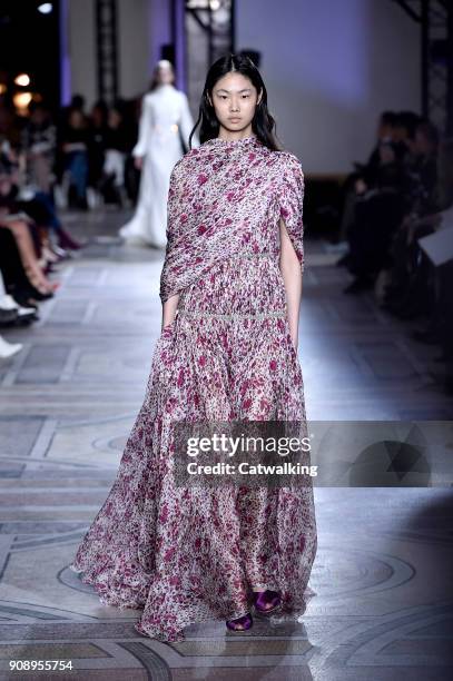 Model walks the runway at the Giambattista Valli Spring Summer 2018 fashion show during Paris Haute Couture Fashion Week on January 22, 2018 in...