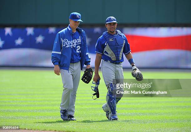 Zack Greinke and Miguel Olivo of the Kansas City Royals walk in from the bullpen before the game against the Detroit Tigers at Comerica Park on...