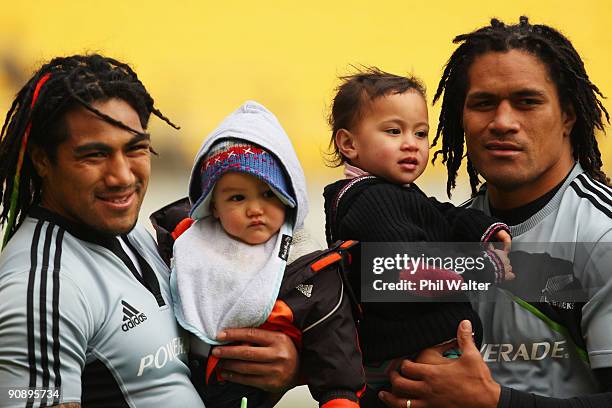 Ma'a Nonu and Rodney So'oialo of the All Blacks with their children Mercury and Payton during the New Zealand All Blacks captain's run at Westpac...