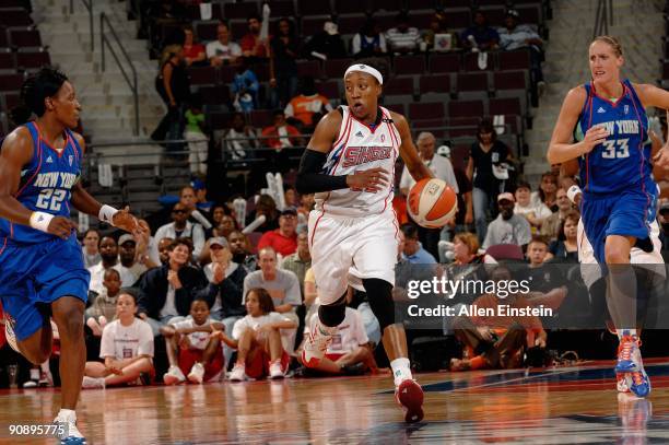 Alexis Hornbuckle of the Detroit Shock drives the ball up court during the WNBA game against the New York Liberty on September 10, 2009 at The Palace...