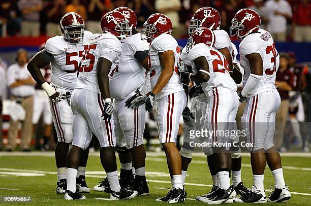 The Alabama Crimson Tide defense against the Virginia Tech Hokies during the Chick-fil-A Kickoff Game at Georgia Dome on September 5, 2009 in...