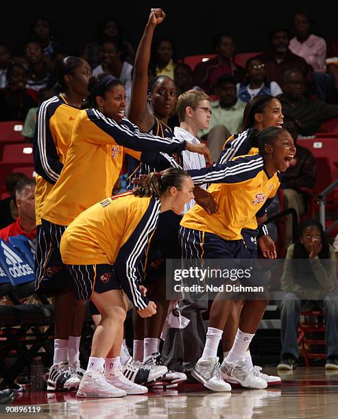 The Indiana Fever bench celebrates against the Washington Mystics during Game One of the WNBA Eastern Conference Semifinals at the Comcast Center on...