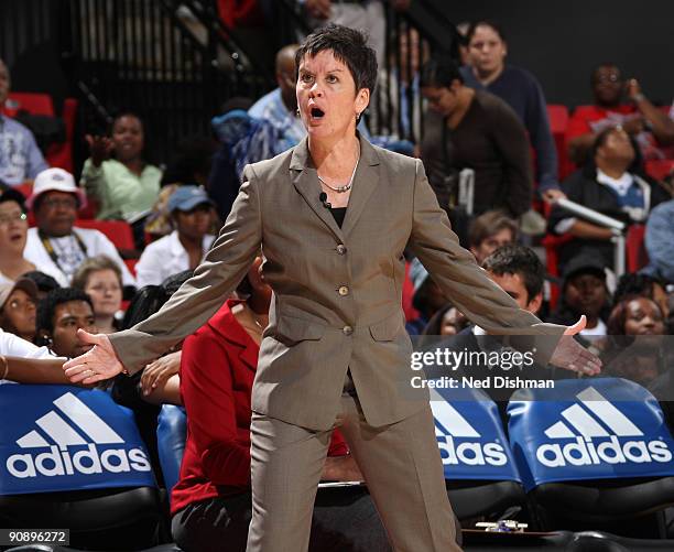 Head coach Julie Plank of the Washington Mystics argues with a call against the Indiana Fever during Game One of the WNBA Eastern Conference...