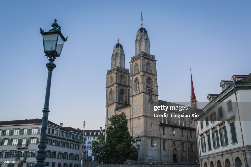 Famous Grossmünster Church in old town Zurich at dusk, Switzerland