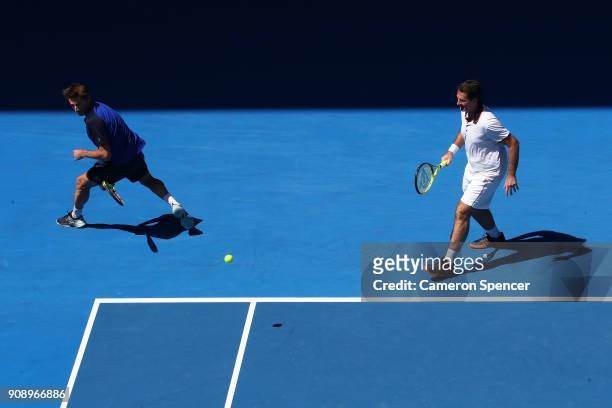 Jacco Eltingh of the Netherlands and Paul Haarhuis of the Netherlands compete in their legend's match against Thomas Enqvist of Sweden and Todd...