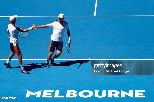 Bob Bryan of the United States and Mike Bryan of the United States compete in their legend's doubles match against Aisam-Ul-Haq Qureshi of Pakistan...