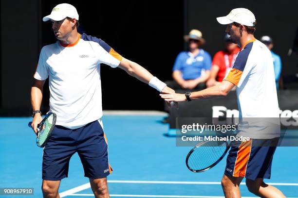 Bob Bryan of the United States and Mike Bryan of the United States compete in their legend's doubles match against Aisam-Ul-Haq Qureshi of Pakistan...