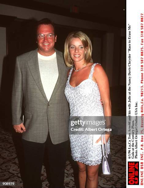 96Tom Arnold and wife Julie at the Nancy Davis" Race to Erase MS " Gala