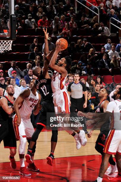 Derrick Jones Jr. #5 of the Miami Heat handles the ball against the Houston Rockets on January 22, 2018 at the Toyota Center in Houston, Texas. NOTE...