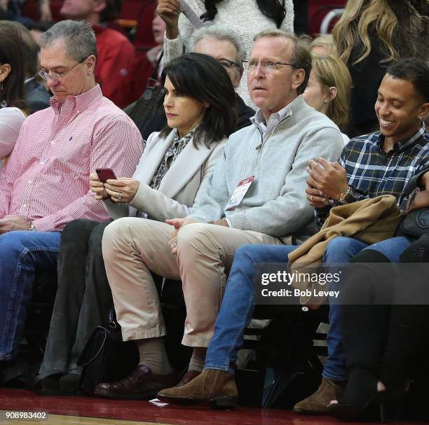 Neil Bush and his wife Maria Andrews sit courtside at a game between the Miami Heat and the Houston Rockets at Toyota Center on January 22, 2018 in...