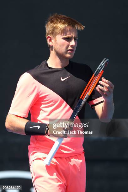 Aidan McHugh of Great Britain looks on against Jamiee Floyd Angele of France during the Australian Open 2018 Junior Championships at Melbourne Park...