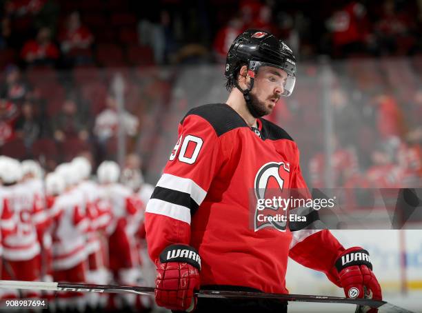 Marcus Johansson of the New Jersey Devils skates off the ice as the Detroit Red Wings celebrate the 3-0 win over the Devils after the game on January...