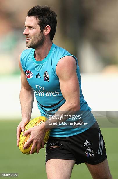 Alan Didak of the Magpies looks to pass the ball during a Collingwood Magpies AFL training session at Gosch's Paddock on September 18, 2009 in...