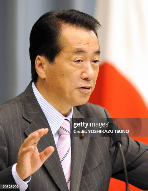 Japan's Deputy Prime Minister Naoto Kan speaks before press at the prime minister's official residence in Tokyo on September 18, 2009. More than 70...