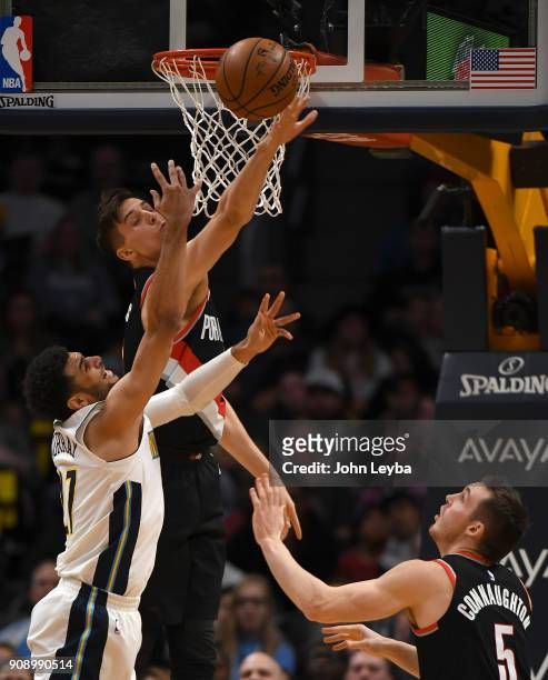 Denver Nuggets guard Jamal Murray gets his shot blocked by Portland Trail Blazers center Zach Collins during the first quarter on January 22, 2018 at...