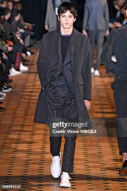 Model walks the runway during the Officine Generale Menswear Fall/Winter 2018-2019 show as part of Paris Fashion Week on January 21, 2018 in Paris,...