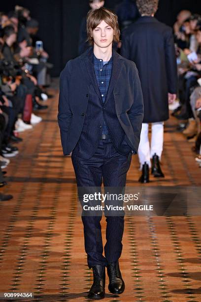 Model walks the runway during the Officine Generale Menswear Fall/Winter 2018-2019 show as part of Paris Fashion Week on January 21, 2018 in Paris,...