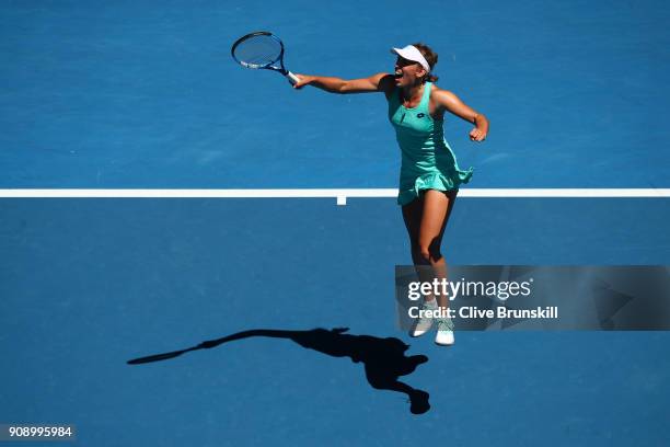 Elise Mertens of Belgium celebrates winning match point in her quarter-final match against Elina Svitolina of Ukraine on day nine of the 2018...