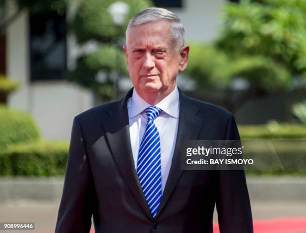 Secretary of Defense Jim Mattis inspects the honor guards during his welcome ceremony at the defence ministry in Jakarta, before his meeting with...