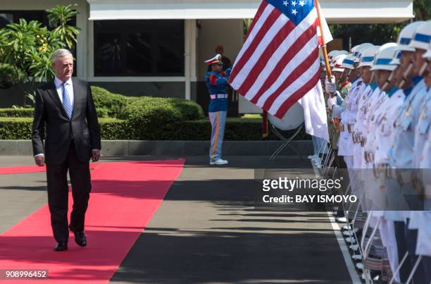 Secretary of Defense Jim Mattis inspects the honor guard during his visit at Indonesia's defence ministry in Jakarta, before meeting with President...