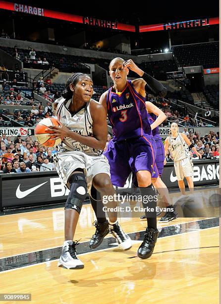 Sophia Young of the San Antonio Silver Stars looks to shoot against Diana Taurasi of the Phoenix Mercury in Game One of the WNBA Western Conference...