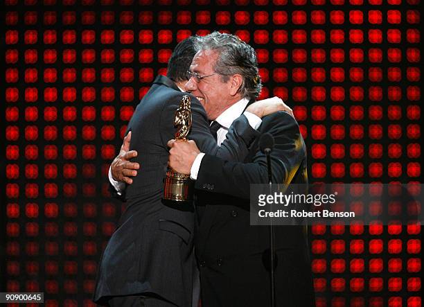 Boxer Oscar De La Hoya accepts the Special Achievement in Sports Television award from Edward James Olmos during the 2009 ALMA Awards held at Royce...