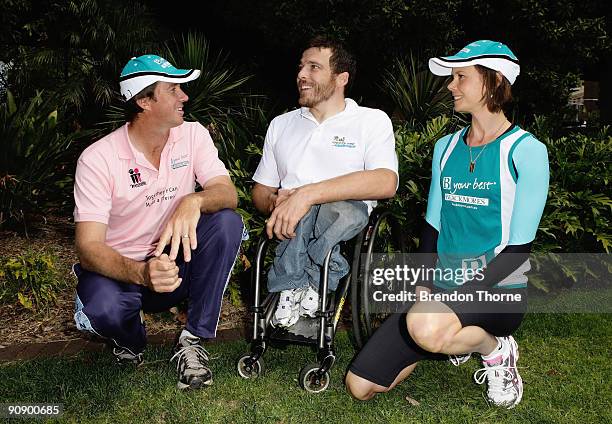 Glenn McGrath, Kurt Fearnley and Antonia Kidman discuss race tactics during a photo call ahead of Sunday's Blackmores Sydney Running Festival,...