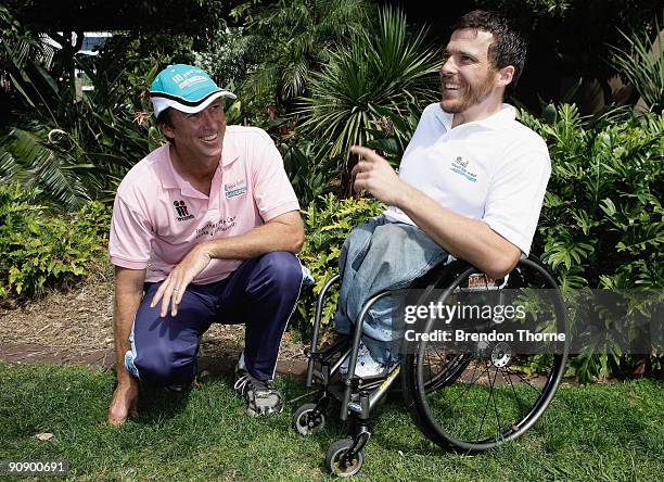 Glenn McGrath talks race tactics with Kurt Fearnley during a photo call ahead of Sunday's Blackmores Sydney Running Festival, welcoming the official...