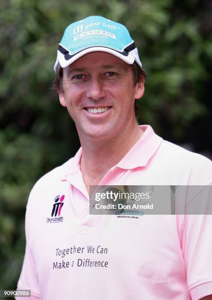 Glenn McGrath attends a photo call ahead of Sunday's Blackmores Sydney Running Festival, welcoming the official race starter Japan's Naoko Takahashi...