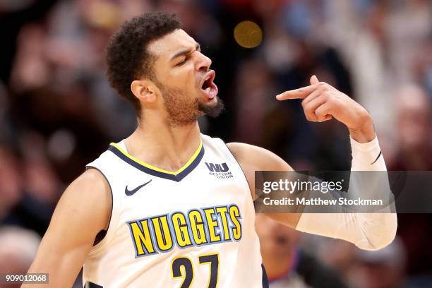 Jamal Murray of the Denver Nuggets celebrates a three point basket to tie the Portland Trail Blazers late in the fourth quarter at the Pepsi Center...