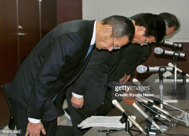 Shinya Yamanaka, a Nobel Prize-winning stem cell researcher and head of Kyoto University's iPS Cell Research and Application, bows at a press...